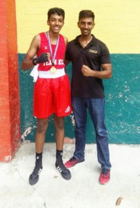 Singapore National Boxing Championship Victory Pose: Youth Boxer Raja and Head Coach of King of Strength