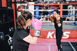 Two Female Boxers Engaged in a Boxing Spar