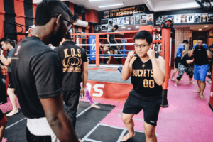 KOS Gym Members Perfecting Their Stance