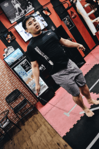 Energetic Gym Goer Practicing Skip Ropes