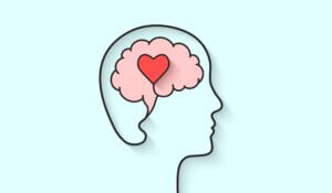 Illustration of a human outline with a heart on the brain.